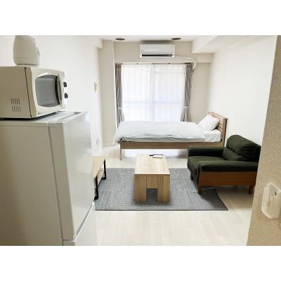 ユニオンマンスリー新松戸１　205　1K・シングル☆【禁煙ルーム】くつろげる一人掛けソファつき♪2ドア冷蔵庫や電子レンジなど生活家電のあるお部屋！安心の建物オートロック完備の物件画像